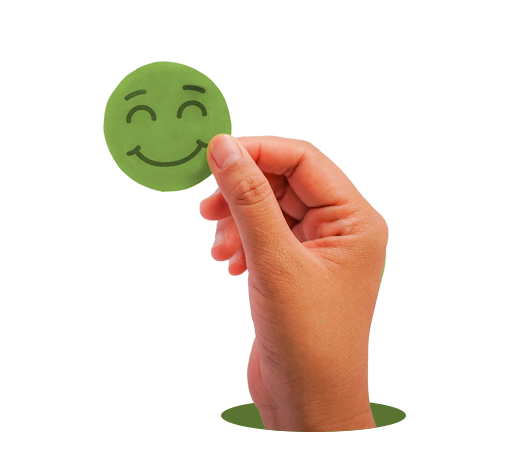 Hand holding a green smiley face, emerging from a hole.